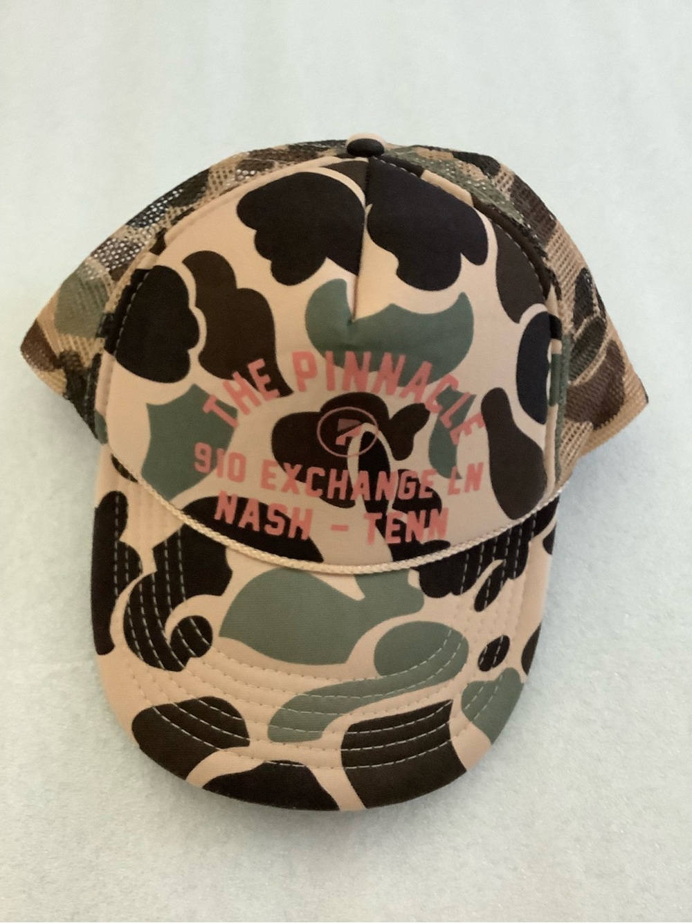 The Pinnacle Camouflage Trucker Hat - Pink/Green/Black